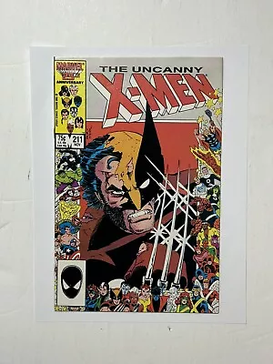 Buy UNCANNY X-MEN #211 (NM-) • Marvel 1986 • 25th Anniversary Frame Cover • 15.25£