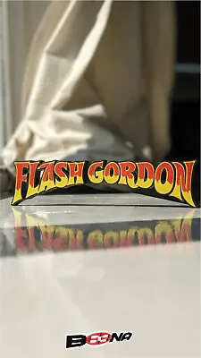 Buy Flash Gordon Plastic Logo Display Sign - Comic Book Version • 20£