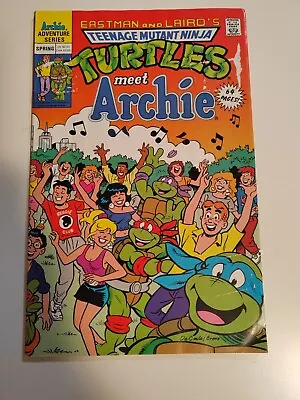 Buy Eastman And Laird’s Teenage Mutant Ninja Turtles Meet Archie - Spring 1991 • 10£