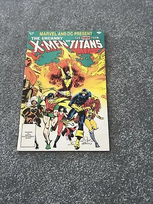 Buy Marvel And DC Present The Uncanny X-Men And The New Teen Titans #1 1982 • 12£